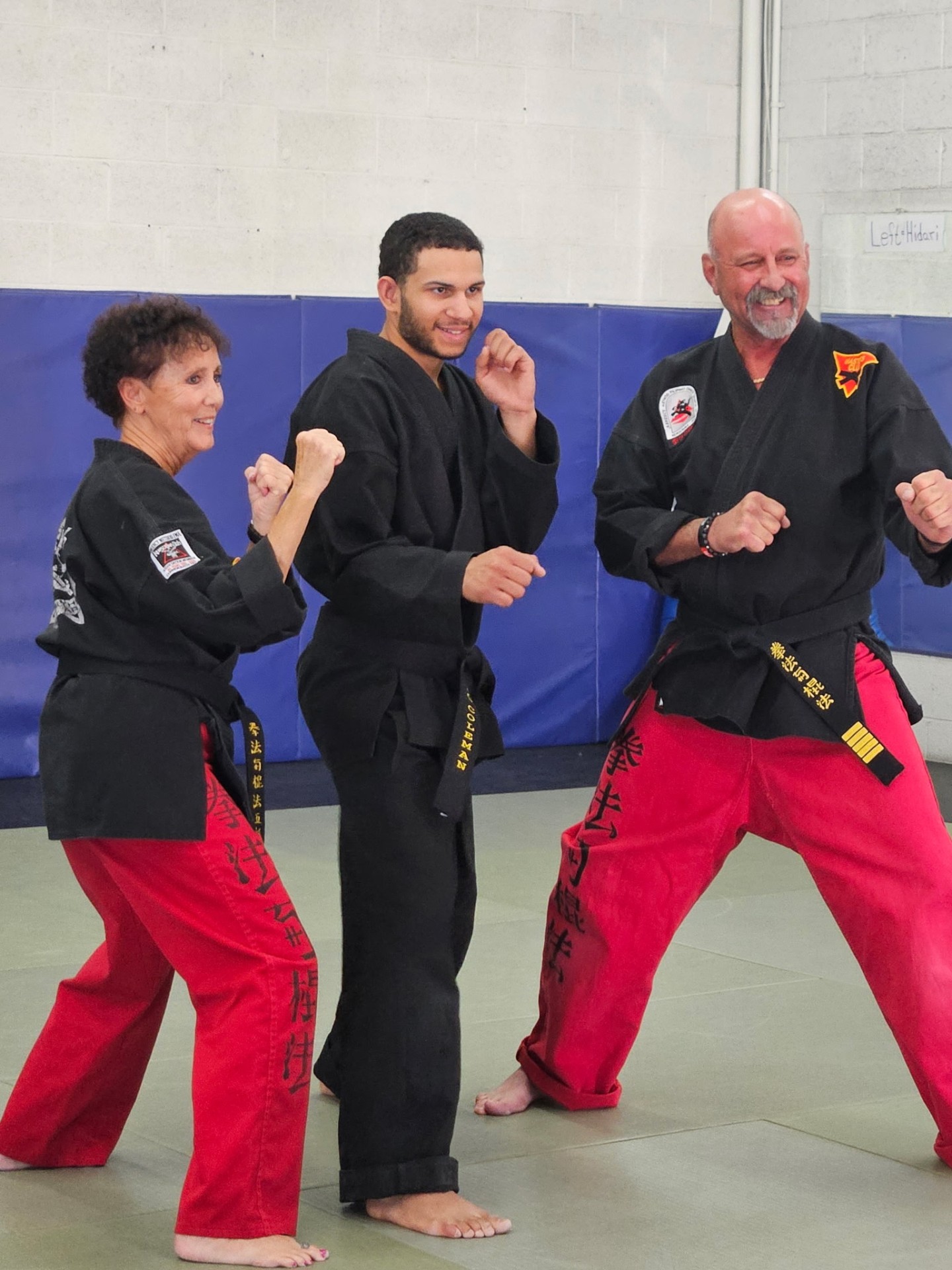 Prescott Family Karate volunteer instructors in fighting stance